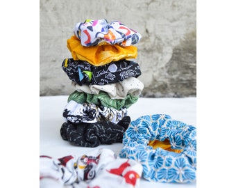 Handmade colourful scrunchies with fun prints ; cat print scrunchie ; honeycomb ; mathematics ; science