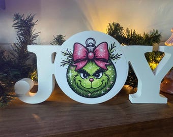The grinch table top christmas decoration. Ho ho ho. Let it snow.