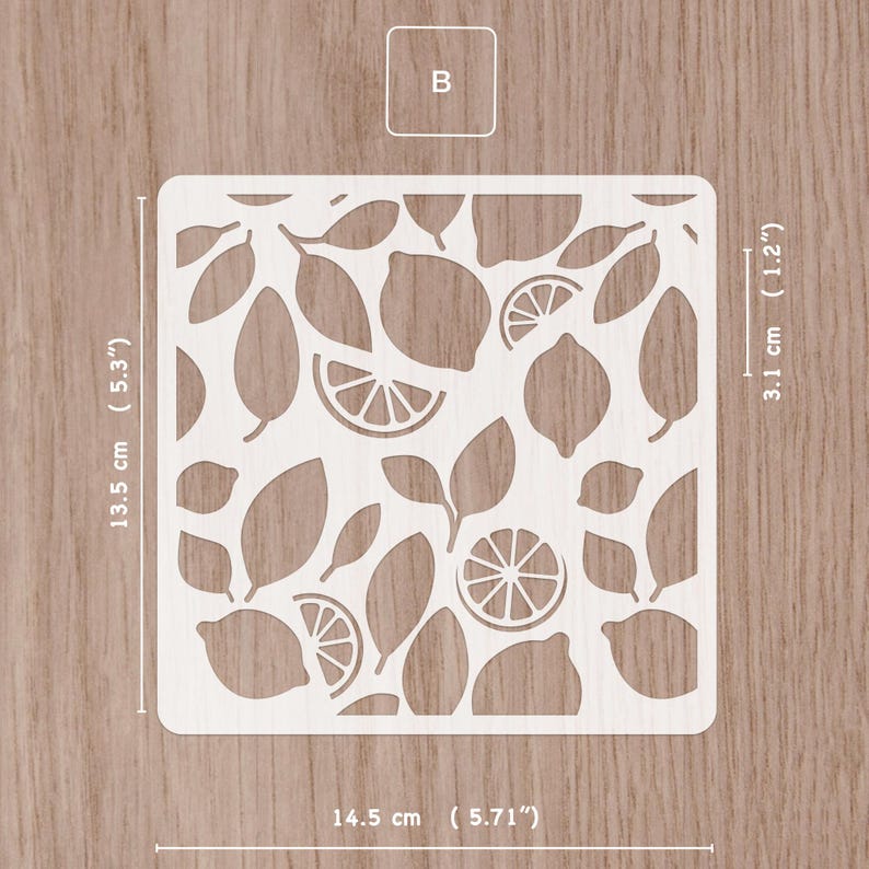 May include: A square stencil with a lemon and leaf design. The stencil is 5.71 inches wide, 5.3 inches tall, and 1.2 inches thick. The stencil has a repeating pattern of lemons, lemon slices, and leaves. The letter "B" is in the upper left corner.