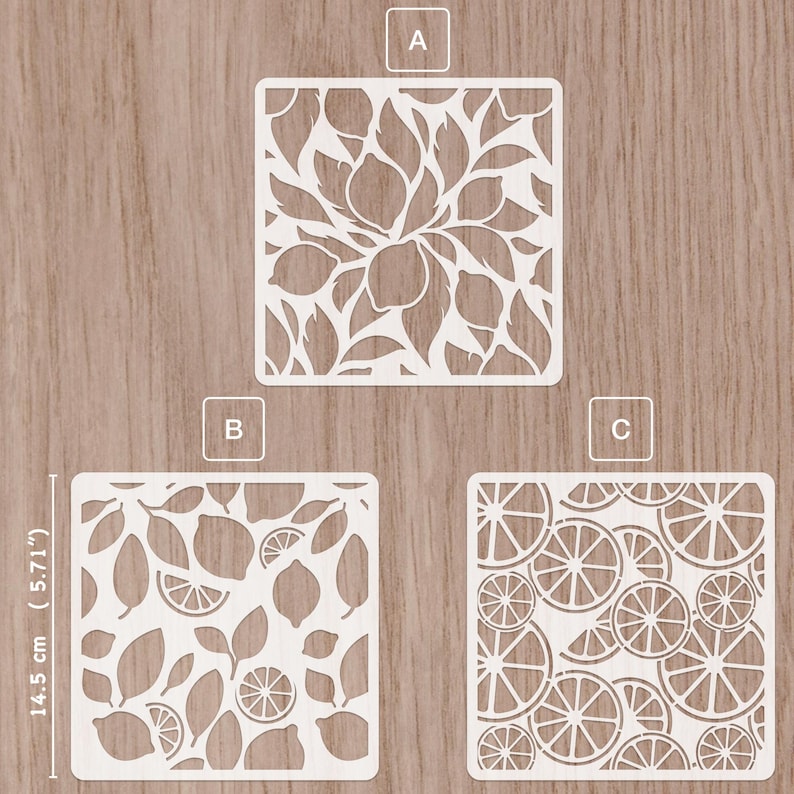 May include: Three white square stencils with citrus fruit designs. One stencil features a lemon and leaf pattern, another has lemons and leaves, and the third shows sliced oranges. The stencils are 5.71 inches (14.5 cm) in height.