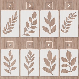 May include: Eight different stencil designs for crafting projects. Each stencil features a unique leaf design, perfect for adding a touch of nature to your home decor.