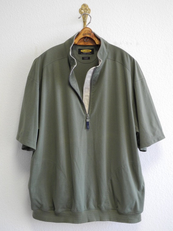 greg norman play dry golf shirts