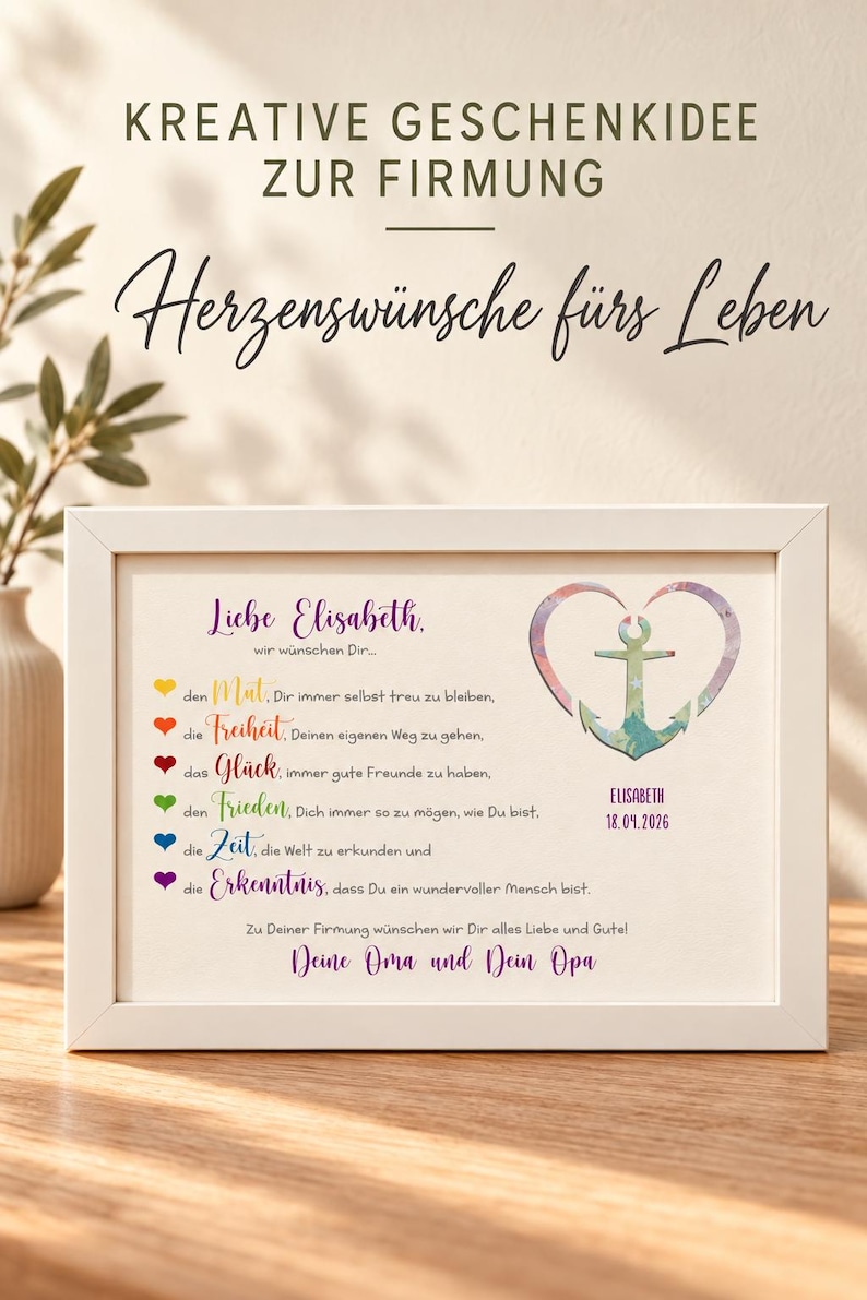 May include: A white framed print featuring German text, a colorful heart-shaped anchor graphic, and the name Elisabeth with the date 18.04.2026. The text includes lists of wishes with small colored heart icons in yellow, red, dark red, green, blue, and purple.