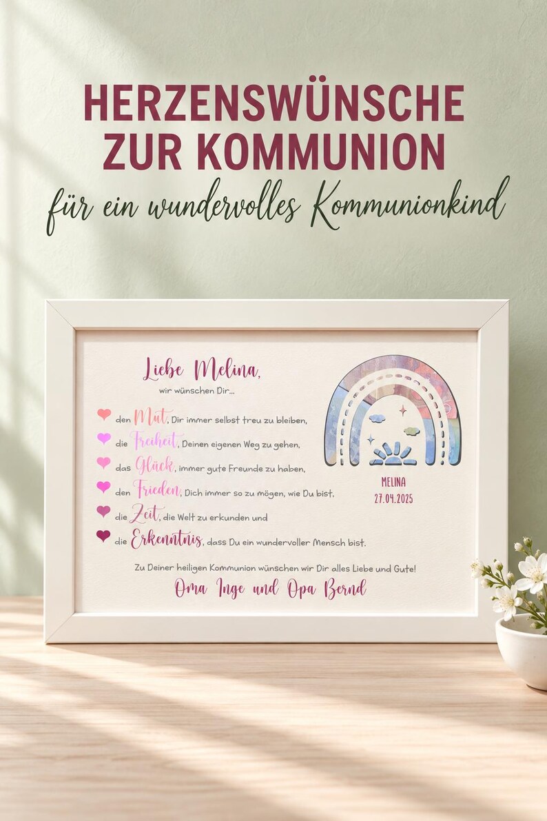 May include: A white rectangular frame containing a personalized print for a communion. The text reads 'HERZENSW&Uuml;NSCHE ZUR KOMMUNION', 'Liebe Melina', and includes a list of wishes with pink heart icons. A colorful rainbow graphic features the name 'MELINA' and the date '27.04.2025'.