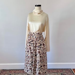 Two piece silk top and botanical print skirt set