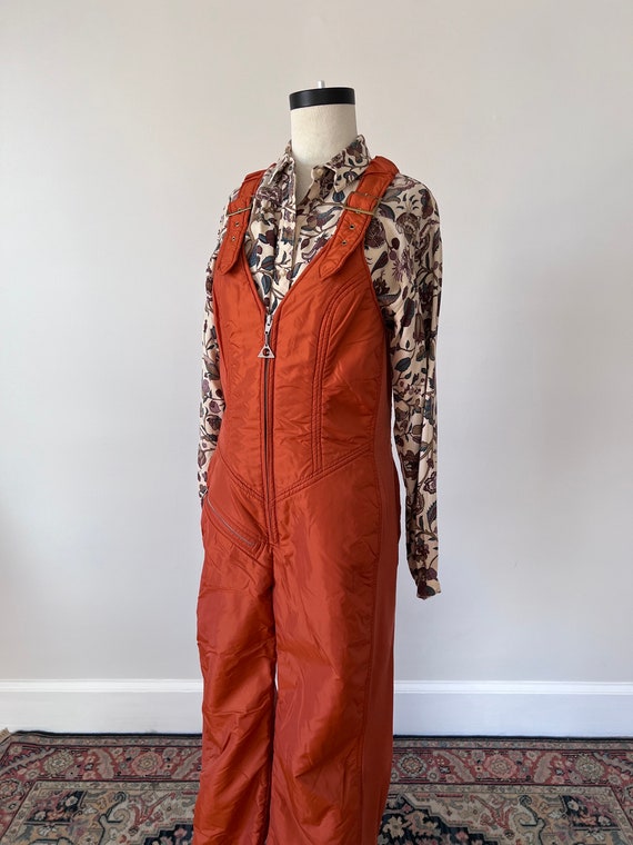 Burnt orange 70s ski suit