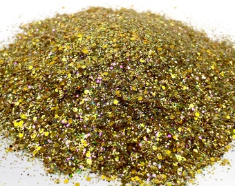 May include: A pile of gold glitter with iridescent shimmer. The glitter is a mix of fine and chunky sizes.