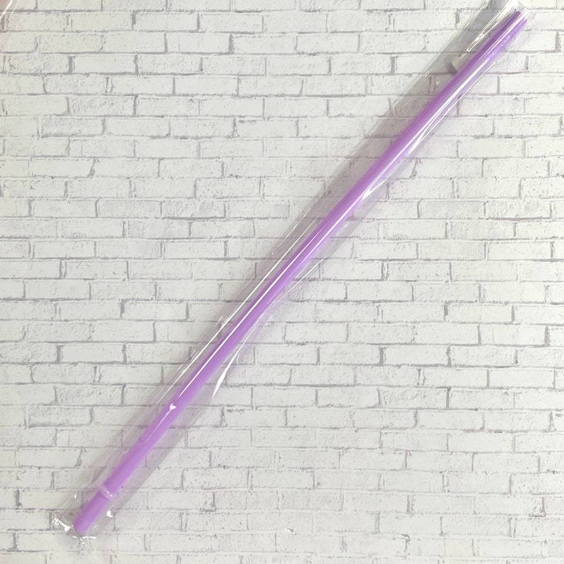May include: A long, thin, purple silicone straw in clear plastic packaging.