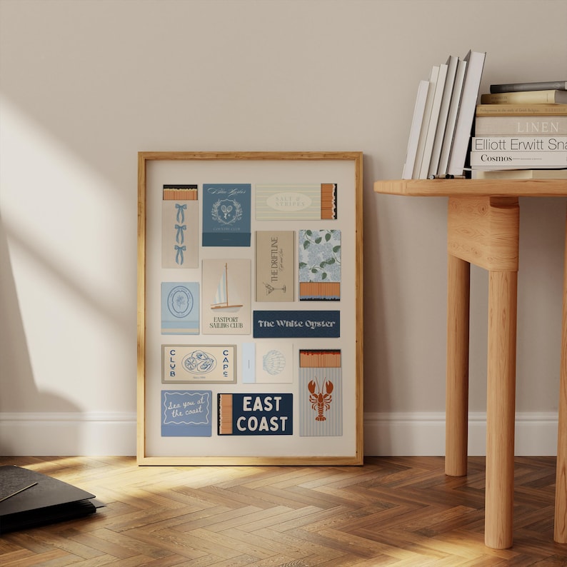 Framed coastal collage featuring seaside matchbooks and travel designs – perfect for modern coastal interiors.