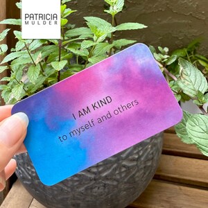 Little box of connection made to inspire and bring people together. Includes discovery papers that ask meaningful prompts and power glass pebbles with you are kind, you are strong and other versions. Also 9 affirmation cards, and a small glassine envelope with 6 little gemstones. There’s also a paper pouch with 3 eco friendly stickers in this box. You can pick a blue, yellow or green front and citrine, amethyst or rose quartz gems. Share with friends, lift spirits and gift the gift of connection