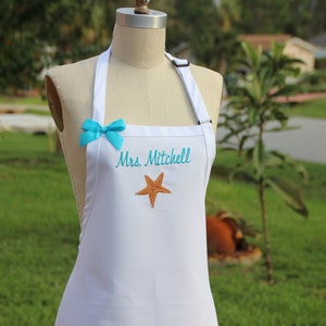 White apron with Sea Sell  . Beach  personalize apron/ Elegant apron / Mrs. Apron / Custom Apron/White apron embroidery in Aqua thread .