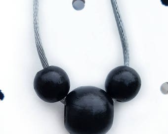 Simple mouse ears necklace.