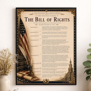 May include: A framed print of the United States Bill of Rights featuring the text of the first ten amendments, an American flag, a quill pen, a stack of books, and a candle. The document has a parchment-style background with ornate borders.