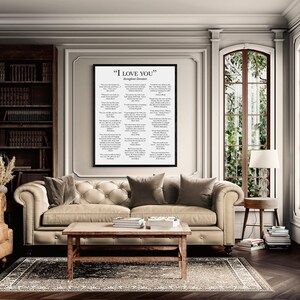 May include: A framed wall art print titled "I LOVE YOU" throughout literature, featuring a collection of romantic literary quotes in black text on a white background, displayed in a simple black frame hanging on a light-colored wall.