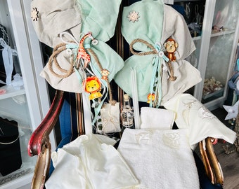 Boys baptismal set with a large wooden lion, beige and mint green linen.