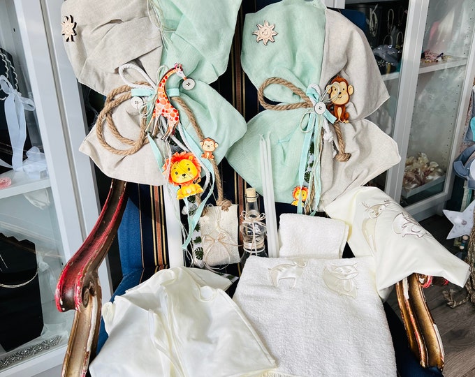 Boys baptismal set with a large wooden lion, beige and mint green linen.