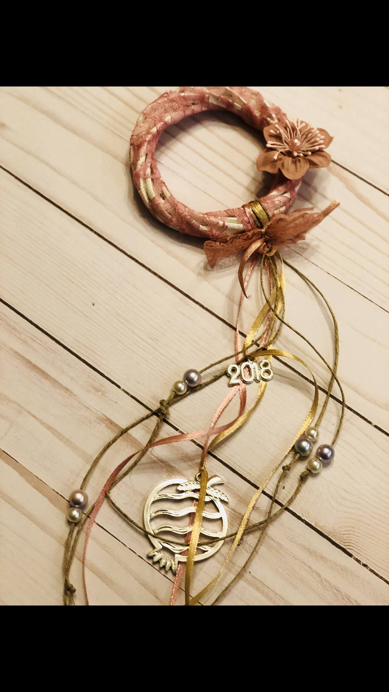 Wooden ornament or good luck charm for 2018