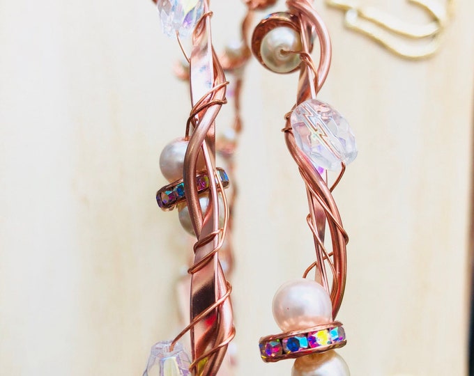 Rose gold crowns with offwhite lace ribbon