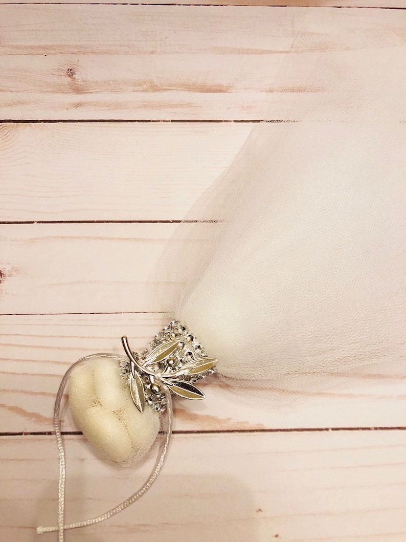 Wedding or baptism bomboniere with greek olive leaf in silver