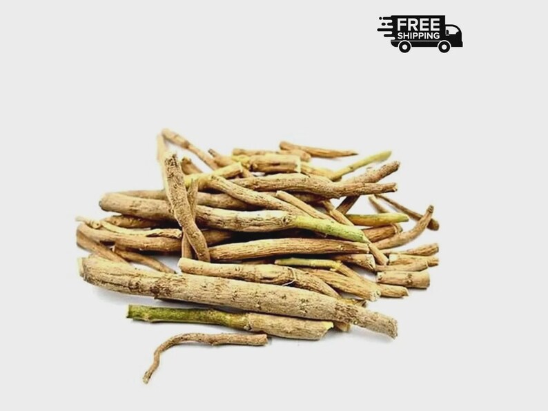 May include: A pile of dried, light brown ashwagandha roots, some with green tips, are displayed against a white background. The roots vary in size and shape, with a few curved pieces. The image includes a "FREE SHIPPING" graphic.