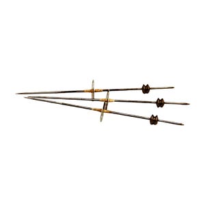May include: Three metal darts with brown fletching and black tips. The darts are tied together with a brown string.