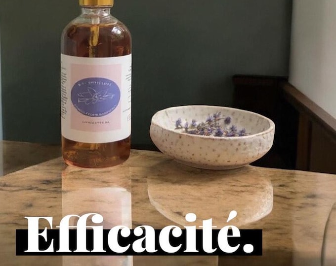Sérum mélange d'huiles naturelles avec spray pour la pousse des cheveux