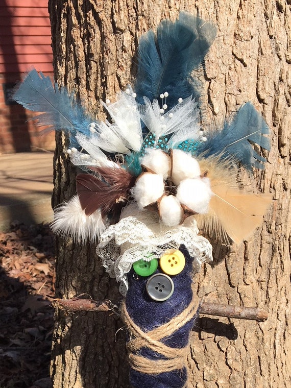 blue voodoo doll