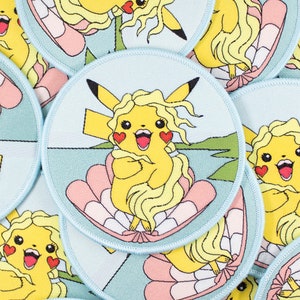 May include: A collection of colorful embroidered patches featuring a cartoon character with yellow hair and a pink shell. The patches are on a blue background and have a whimsical, cartoon style.