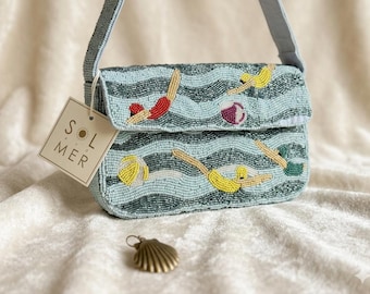 Hand-Beaded Blue Wave Shoulder Bag – "Seaside Swimmers" Motif, Sol and Mer Artisan Bag