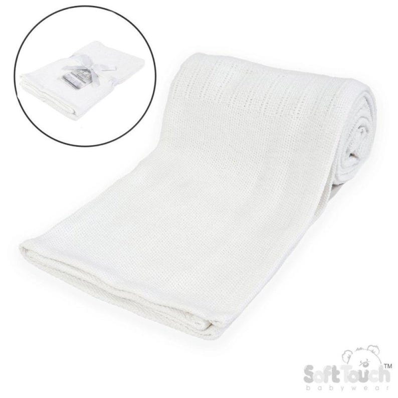 May include: A white baby blanket, folded and rolled, with a textured knit pattern. The blanket is displayed on a white background. A smaller, folded version is shown in a circular inset. The blanket is made of soft material.
