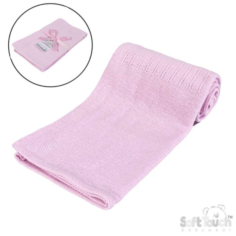 May include: A light pink baby blanket, rolled up and displayed on a white background. The blanket is made of a soft, knitted material. A smaller, folded version of the blanket is shown in a circular inset, tied with a pink ribbon.