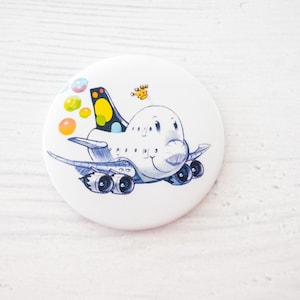 runder Magnet mit der kleinen Princess of the Skies - POTS - für deinen Kühlschrank oder dein Magnetboard Motiv mit bunten Luftblasen