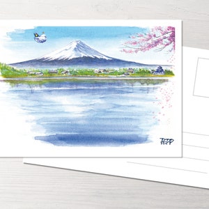Könnte beinhalten: Aquarellmalerei des Mount Fuji mit einem See im Vordergrund und einem Kirschblütenbaum im Hintergrund. Das Gemälde ist unten rechts mit "TEPP" signiert.