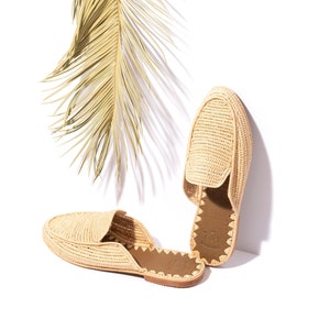 Moroccan Raffia Slide Sandals in the shade of the palm tree