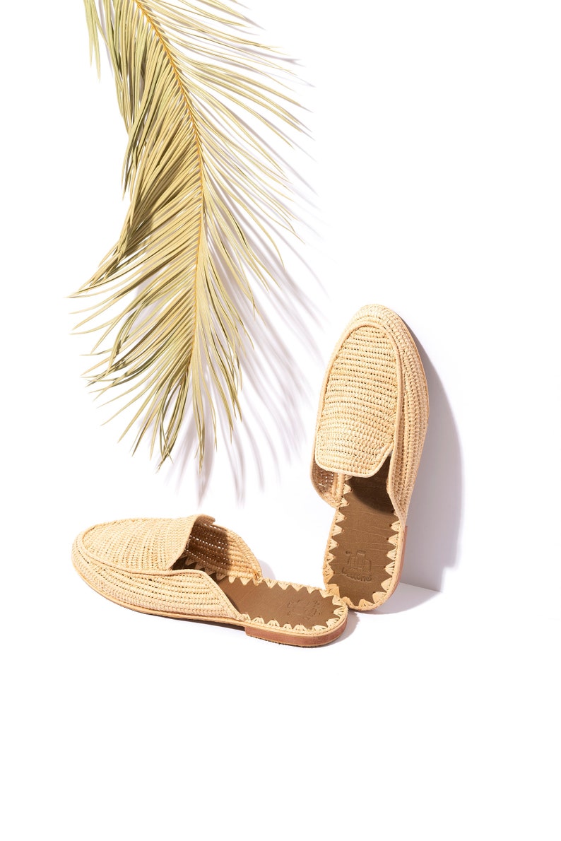 Moroccan Raffia Slide Sandals in the shade of the palm tree