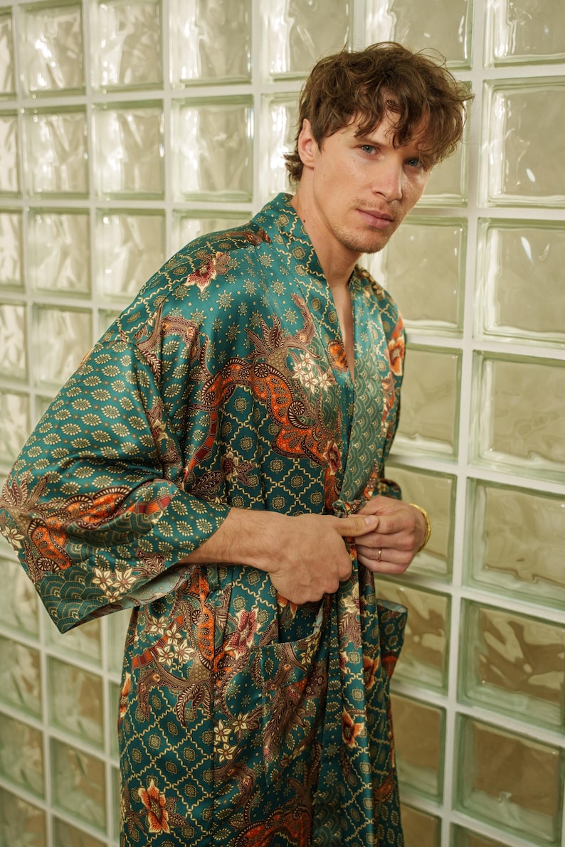 Mens green kimono robe styled indoors against glass wall