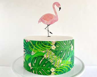 Envoltorio comestible para pastel o adorno para pastel de flamenco con follaje tropical verde y fondo rosa