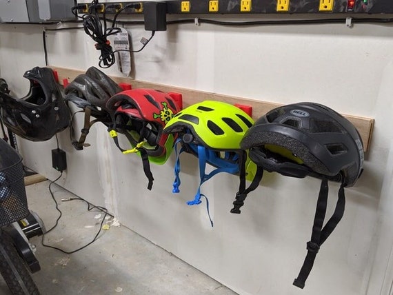 Colgador para colgar en la pared del casco de bicicleta Almacenamiento de  casco elegante y que ahorra espacio -  España
