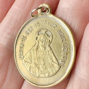 Antique French Jesus Heart pendant in brass, vintage Sacred Heart of Jesus medal w Mary&#39;s Heart on the back, catholic protection medal gift