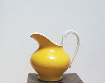 SOLD SEPERATELY. Vintage Limoges Creamer. Limoges Legrand. Raynaud Limoges. Alsace Creil et Montereau Creamer. Small Yellow and Blue Jugs.