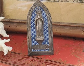 Vintage 1940s French Metal Altar Statue Plaque Souvenir From Lourdes France of The Virgin Mary with Diamond Pattern Blue and White Backing.