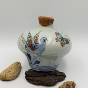 Vintage Mexican Tonala &#39;El Palomar&#39; Ceramic Folk Art Vase With Bird Design And Flowers On The Back in Blue and Brown Tones Glazed Finish