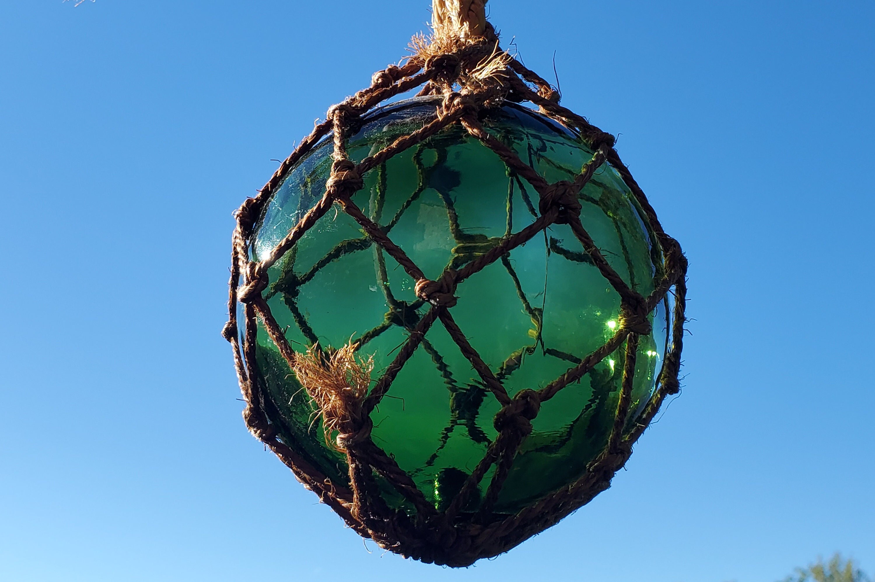 Vintage French Green Glass Fishing Float in Hemp. Green Glass