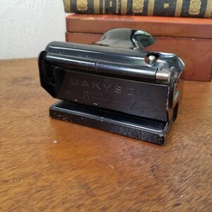 Vintage JAKYSON Paper Hole Punch: 1950s Black Metal Office Decor
