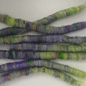 Wisterias  in Spring. Handmade rolags. Made by my 13yr  old daughter. Use for spinning weaving, crafting etc. Wool silk blend.