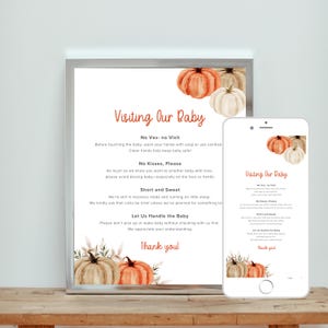 Pode incluir: Um letreiro emoldurado e um smartphone exibem um guia de visita para bebês. O letreiro apresenta abóboras em aquarela e o texto "Visiting Our Baby". O guia inclui instruções para os visitantes, como lavar as mãos e evitar beijos.
