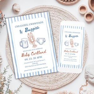 May include: Two baby shower invitations with blue and white striped borders. The invitations read "Chuggies, Crawdads & Buggies" and include illustrations of a beer mug, a lobster, and a diaper. The text "Baby Cartland" is also featured.