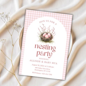 May include: A pink and white gingham patterned invitation for a nesting party honoring Allison and Baby Mya. The invitation features a watercolor illustration of a bird's nest with pink eggs and a floral sprig. The text reads "Join us for a nesting party honoring Allison & Baby Mya" with the date, time, address, and RSVP information.