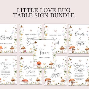 May include: A bundle of baby shower table signs with a floral and mushroom theme. The signs include text such as "Drinks", "Guest Book", "Food", "Favors", "Cards & Gifts", "Momosa Bar", "Babies Sweet", and "Diaper Raffle".