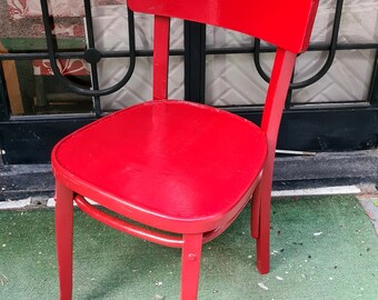 Rode vintage houten stoel